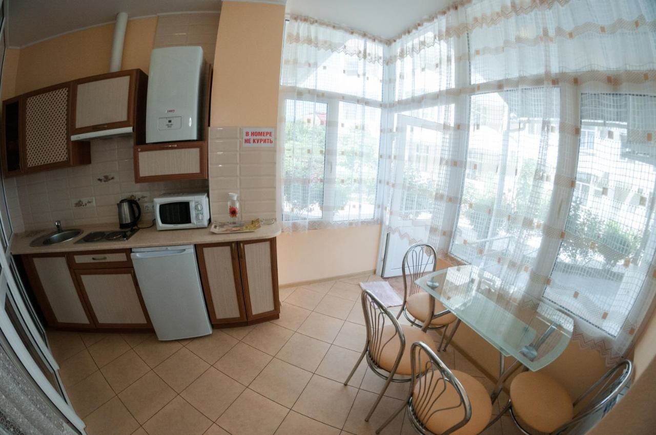 Апартаменты Rooms on Chernomorskaya Naberezhnaya Феодосия-17
